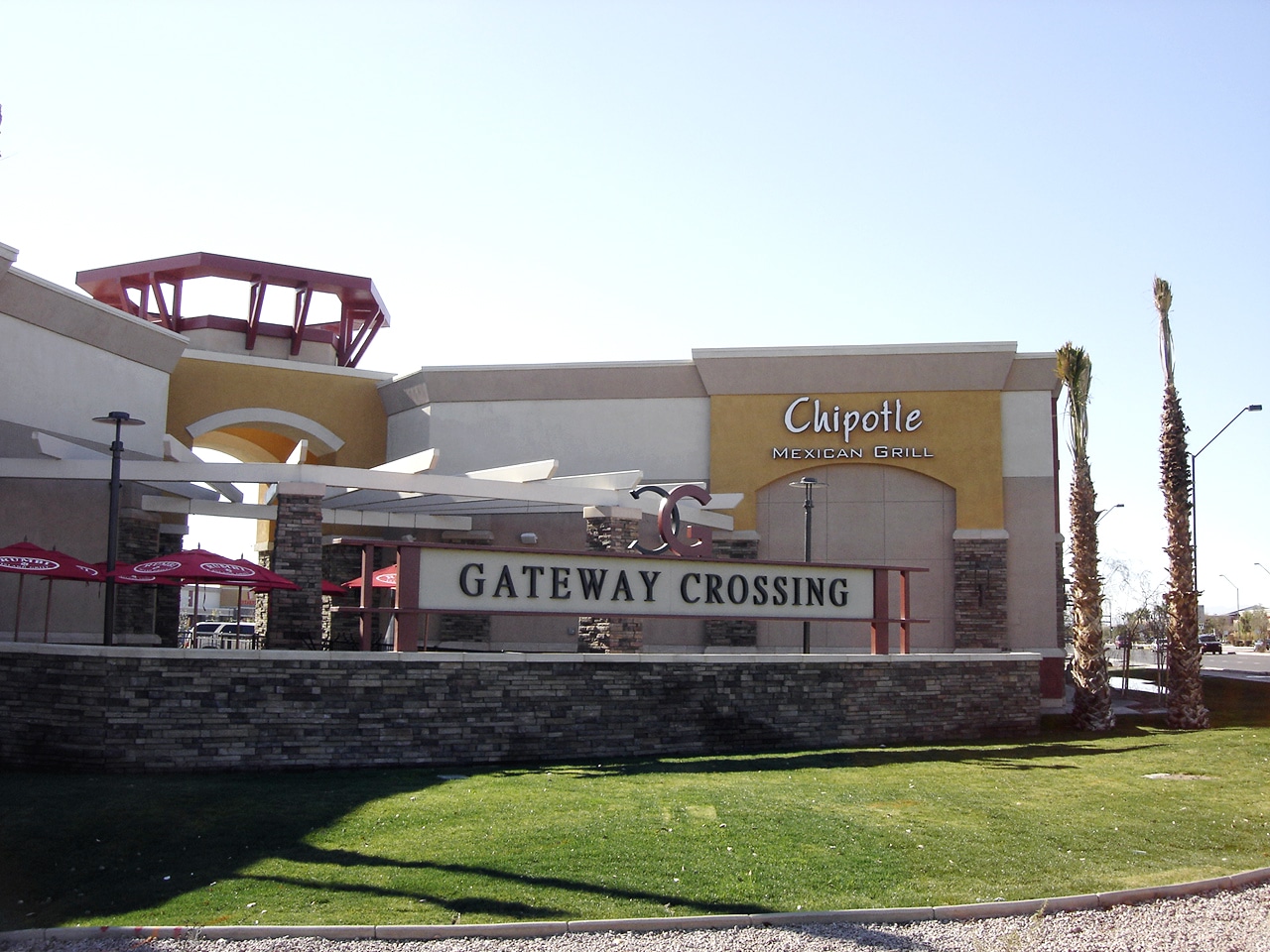 A building with a sign that says gateway crossing.